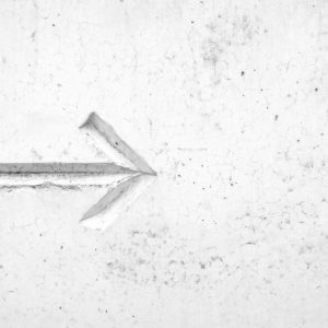 right arrow sign on wall